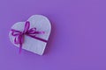 Heart shape present box with ribbon bow Royalty Free Stock Photo