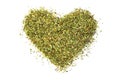Heart shape from provence herbs on a white isolated background. Flat lay. Dried herbs, seasonings