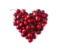 Heart shape red cherries on white background. Background made of cherry. Sweet cherry isolated on white background cutout. Various Royalty Free Stock Photo