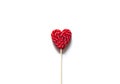 Heart shape red lollipop on the white background. Royalty Free Stock Photo