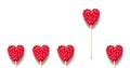 Heart shape red lollipop on the white background. Royalty Free Stock Photo