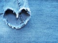 Heart shape ripped jean denim texture