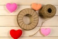 heart shape with roll of twine cord on blank wooden board , vale Royalty Free Stock Photo