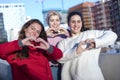 Heart shape from three friends women hands Royalty Free Stock Photo