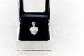 Heart shape white gold locket Royalty Free Stock Photo