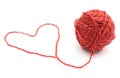 Heart shape and wool ball on white background Royalty Free Stock Photo