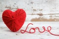 Heart-shaped ball of yarn, with words of love