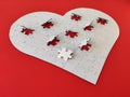 Heart shaped blank white jigsaw puzzle on red background puzzle pieces completing the heart shape Royalty Free Stock Photo