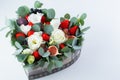 Heart-shaped bouquet of flowers and berries strawberry Royalty Free Stock Photo