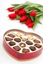 Heart Shaped Box of Candy and Tulips Royalty Free Stock Photo