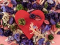 Heart shaped boxes and flower confetti or potpourri on a pink background. Royalty Free Stock Photo