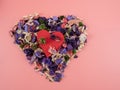 Heart shaped boxes and flower confetti or potpourri on a pink background. Royalty Free Stock Photo