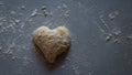 Heart shaped Bread dough  on floured board ,making bread rolls at home Royalty Free Stock Photo