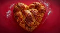 Heart-shaped buns with sesame seeds on a red background Royalty Free Stock Photo