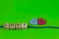 Heart shaped buttons and word Love on blocks