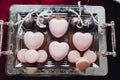 Heart-shaped Cake. Beautiful delicious heart shaped cakes, pink color. Sweets brilliant, sweet.