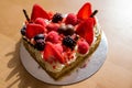 Heart shaped cake with red ripe strawberries and fresh berries, raspberries and blueberries. St. Valentine`s Day, Mother`s Day, Royalty Free Stock Photo