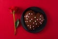 Heart shaped cake and red rose for Valentine`s Day or mother`s Royalty Free Stock Photo