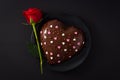 Heart shaped cake and red rose for Valentine`s Day or mother`s Royalty Free Stock Photo