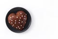 Heart shaped cake for Valentine`s Day or mother`s day on black p Royalty Free Stock Photo