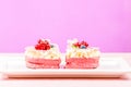 Heart-shaped cakes filled with cream and berries. Royalty Free Stock Photo