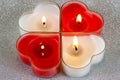 Heart shaped candle burning red and White Royalty Free Stock Photo