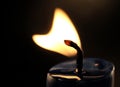 Heart shaped candle flame Royalty Free Stock Photo