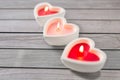 Heart shaped candles burning on valentines day