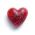 Heart-Shaped Candy with Crystal Sugar Dusting on Pristine White Royalty Free Stock Photo