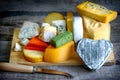 Heart shaped cheese on old boards colorful food abstract Royalty Free Stock Photo