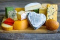 Heart shaped cheese on old boards colorful food abstract Royalty Free Stock Photo