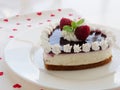 Heart shaped cheesecake with raspberries, graham cracker crust, cream cheese filling and jelly icing for Valentine`s Day