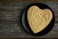 Heart shaped chocolate cake with banana slice Royalty Free Stock Photo