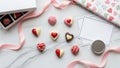 Heart-shaped chocolates and gift items isolated on white background Royalty Free Stock Photo