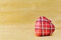 Heart shaped Christmas tree decoration on golden background Royalty Free Stock Photo