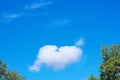 Heart-shaped cloud on a blue sky. Copy space. Concept of love, romance and valentines day Royalty Free Stock Photo