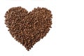 Heart shaped coffee beans. Isolated over white background. Close-up. Space for text Royalty Free Stock Photo