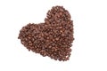 Heart-shaped coffee beans. Isolated white background Royalty Free Stock Photo