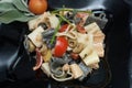 Heart-Shaped Colorful Pasta with Sauce, olivevs, Tomatoes in Black Plate. top view. food. Royalty Free Stock Photo