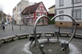 Heart-shaped contemporary sculpture in the cobblestone town square, Bad Nauheim, Germany