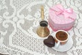 Heart shaped cookie with red gift box with bow and cup of coffee Royalty Free Stock Photo