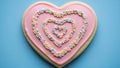 Heart-shaped cookie with sprinkles Royalty Free Stock Photo