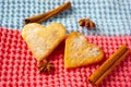 Heart-shaped cookies on bright background