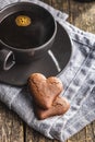 Heart shaped cookies and coffee cup on wooden table Royalty Free Stock Photo