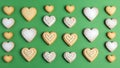 Heart-shaped cookies on green background Royalty Free Stock Photo