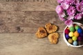 Heart shaped cookies. Top view of homemade cookies, flower chrysanthemum and colorful marbles. Healthy dessert with cinnamon