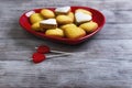 Heart shaped cookies and two candles Royalty Free Stock Photo