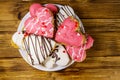 Heart shaped cookies on wooden table. Top view. Dessert for Valentine day