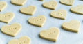 Heart shaped cookies with the word LOVE ready to bake. Pastry Concept Royalty Free Stock Photo