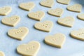 Heart shaped cookies with the word LOVE ready to bake. Pastry Concept Royalty Free Stock Photo